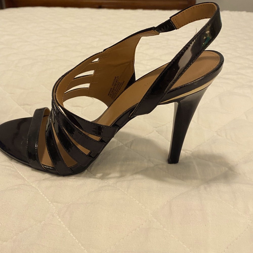 Black patent dress heels. Size 10. Worn 2 times. Calvin Klein